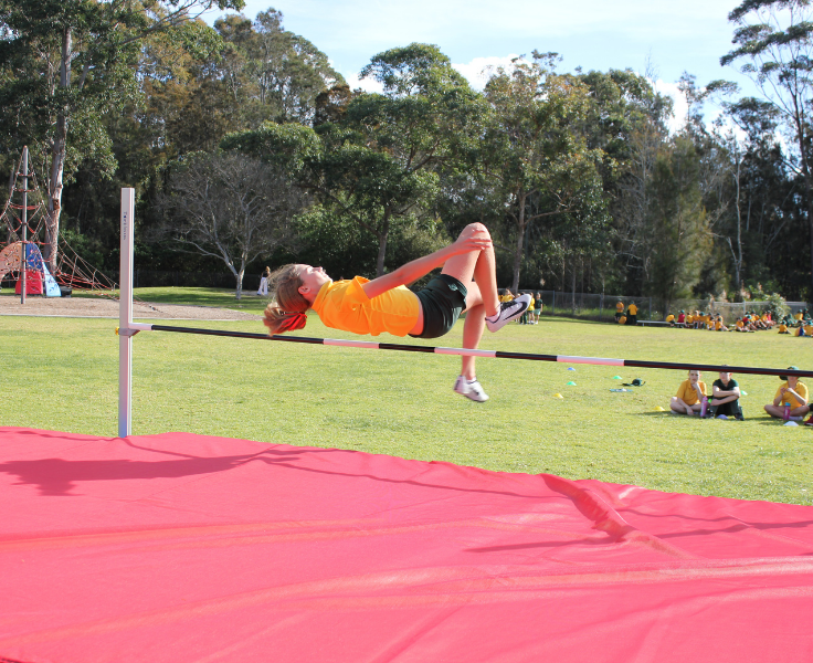 Student doing high jump